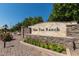 Stone entrance sign to San Tan Ranch, featuring manicured landscaping, and a welcoming atmosphere for residents and visitors alike at 3668 E Derringer Way, Gilbert, AZ 85297