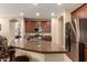 Well-equipped kitchen with granite countertops, stainless steel appliances, and ample cabinet space at 3693 E Sparrow Pl, Chandler, AZ 85286