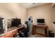 Home office featuring built-in desk, providing a functional and organized workspace at 3693 E Sparrow Pl, Chandler, AZ 85286