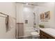 Well-lit bathroom with modern fixtures, stylish shower curtain, and a clean, inviting atmosphere at 3931 E Weather Vane Rd, Gilbert, AZ 85296
