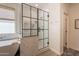 Modern bathroom with freestanding tub, open-concept shower, mosaic tile and ample light at 3931 E Weather Vane Rd, Gilbert, AZ 85296