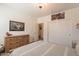 Comfortable bedroom with stylish decor, neutral paint, closet and warm carpet at 3931 E Weather Vane Rd, Gilbert, AZ 85296