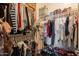 Walk-in closet with ample storage featuring clothing racks, shelves, and overhead storage at 3931 E Weather Vane Rd, Gilbert, AZ 85296