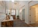 Inviting foyer boasting a high ceiling, hardwood floors, and an elegant chandelier and decorative furnishings at 3931 E Weather Vane Rd, Gilbert, AZ 85296