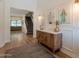 Open foyer showcasing a staircase, wooden flooring, and stylish decor that creates an inviting atmosphere at 3931 E Weather Vane Rd, Gilbert, AZ 85296