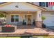 Charming front porch with brick pavers, offering a welcoming entrance to the home and stylish accents at 3931 E Weather Vane Rd, Gilbert, AZ 85296