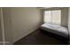 Bedroom with a large window at 4111 W Reade Ave, Phoenix, AZ 85019