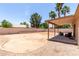 Spacious backyard featuring a covered patio at 423 W Century Ct, Gilbert, AZ 85233