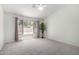 Bedroom with neutral carpet, a ceiling fan, and a decorative houseplant at 423 W Century Ct, Gilbert, AZ 85233