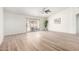 Bright living room featuring wood floors, sliding glass doors and ample natural light at 423 W Century Ct, Gilbert, AZ 85233