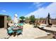 Backyard oasis with patio furniture, a pool, and lush landscaping perfect for outdoor entertaining at 4530 E White Feather Ln, Cave Creek, AZ 85331