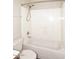 Full bathroom with a shower-tub combo featuring a white tile surround and a handheld shower head at 4530 E White Feather Ln, Cave Creek, AZ 85331