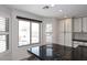 Kitchen eat-in area showcasing natural light and sleek countertops and custom cabinetry at 4530 E White Feather Ln, Cave Creek, AZ 85331
