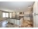 Gourmet kitchen with a large island, custom cabinets, granite countertops and professional-grade stainless steel appliances at 4530 E White Feather Ln, Cave Creek, AZ 85331