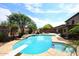 Beautiful backyard pool with diving board, spa and desert landscaping at 4530 E White Feather Ln, Cave Creek, AZ 85331