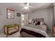 Bedroom with play pen and closet with lots of natural light at 4648 W Misty Willow Ln, Glendale, AZ 85310