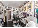 Home gym setup features cycling machines, exercise equipment, team photos, and memorabilia at 4648 W Misty Willow Ln, Glendale, AZ 85310