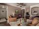 Comfortable living room boasts neutral walls and comfortable furnishings at 4648 W Misty Willow Ln, Glendale, AZ 85310