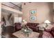 Bright living room with two-story ceilings and elegant decor at 4648 W Misty Willow Ln, Glendale, AZ 85310