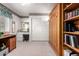 Bright office featuring a built-in desk area, large closet, and additional shelving at 4648 W Misty Willow Ln, Glendale, AZ 85310