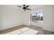 Bright, airy bedroom features a large window providing natural light and a calming street view at 4725 E Brown Rd # 13, Mesa, AZ 85205