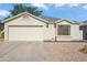 Charming single-story home with a two-car garage, neutral stucco exterior, and low-maintenance landscaping at 4725 E Brown Rd # 13, Mesa, AZ 85205
