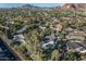 Neighborhood aerial view features mature landscaping, backyard pool, and stunning mountain views at 5112 N 41St St, Phoenix, AZ 85018