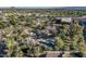 Aerial view of property, showing outdoor pool, mature trees, and neighborhood amenities at 5112 N 41St St, Phoenix, AZ 85018