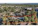 Aerial view of property showing well-maintained yard, outdoor pool, and neighborhood at 5112 N 41St St, Phoenix, AZ 85018