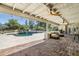 Expansive covered patio with views of the pool and outdoor living spaces at 5112 N 41St St, Phoenix, AZ 85018