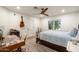 Bedroom featuring natural light, a ceiling fan and wood floors at 5112 N 41St St, Phoenix, AZ 85018