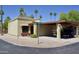 Charming single-story home with a covered carport, xeriscaping, and a quaint neighborhood street view with blue skies at 520 S Sand Verbena Way, Mesa, AZ 85208