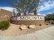 The entrance sign to Lone Mountain community on a sunny day with blue skies and desert landscaping at 5650 E Ocupado Dr, Cave Creek, AZ 85331
