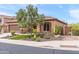 Beautiful single-story home with desert landscaping, tile roof, and inviting curb appeal at 5650 E Ocupado Dr, Cave Creek, AZ 85331