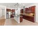 Spacious kitchen features stainless steel appliances, granite counters, and large island at 5650 E Ocupado Dr, Cave Creek, AZ 85331