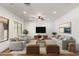 Bright living room featuring modern furnishings, wood floors, and neutral decor at 5650 E Ocupado Dr, Cave Creek, AZ 85331