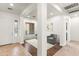 Open-concept living space with a large window, comfortable seating, and neutral decor at 5650 E Ocupado Dr, Cave Creek, AZ 85331