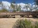 Lone Mountain Community Park sign with desert landscaping and trees at 5650 E Ocupado Dr, Cave Creek, AZ 85331