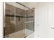 Modern shower and tub combination with glass doors and custom tile work at 5650 E Ocupado Dr, Cave Creek, AZ 85331