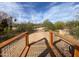 View from a bridge over walking path with desert landscape and homes in distance at 5650 E Ocupado Dr, Cave Creek, AZ 85331