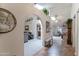Open concept living area with arched doorways and plenty of natural light from skylights at 5758 E Fox St, Mesa, AZ 85205