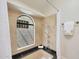 Bathroom features decorative tile, soaking tub, tile surround, and shower at 6525 N 3Rd St, Phoenix, AZ 85012