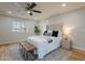 Bedroom featuring neutral tones, hardwood floors, and a ceiling fan at 6525 N 3Rd St, Phoenix, AZ 85012