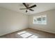 Bedroom featuring neutral tones, a ceiling fan, and carpet flooring at 6525 N 3Rd St, Phoenix, AZ 85012