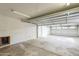 A large garage has room for parking and storage and has a stucco wall at 6525 N 3Rd St, Phoenix, AZ 85012