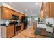 Kitchen showcases stainless steel appliances, granite countertops, and wood cabinets at 6525 N 3Rd St, Phoenix, AZ 85012