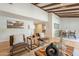 Bright living room featuring exposed wood beam ceilings and contemporary furnishings at 6525 N 3Rd St, Phoenix, AZ 85012