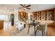 Comfortable living space with built in bookcase, wooden floors, and furniture at 6525 N 3Rd St, Phoenix, AZ 85012