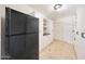 Pantry featuring lots of storage, white cabinets, and tile flooring at 6525 N 3Rd St, Phoenix, AZ 85012