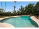 A private swimming pool surrounded by a well-maintained patio and fencing at 6525 N 3Rd St, Phoenix, AZ 85012